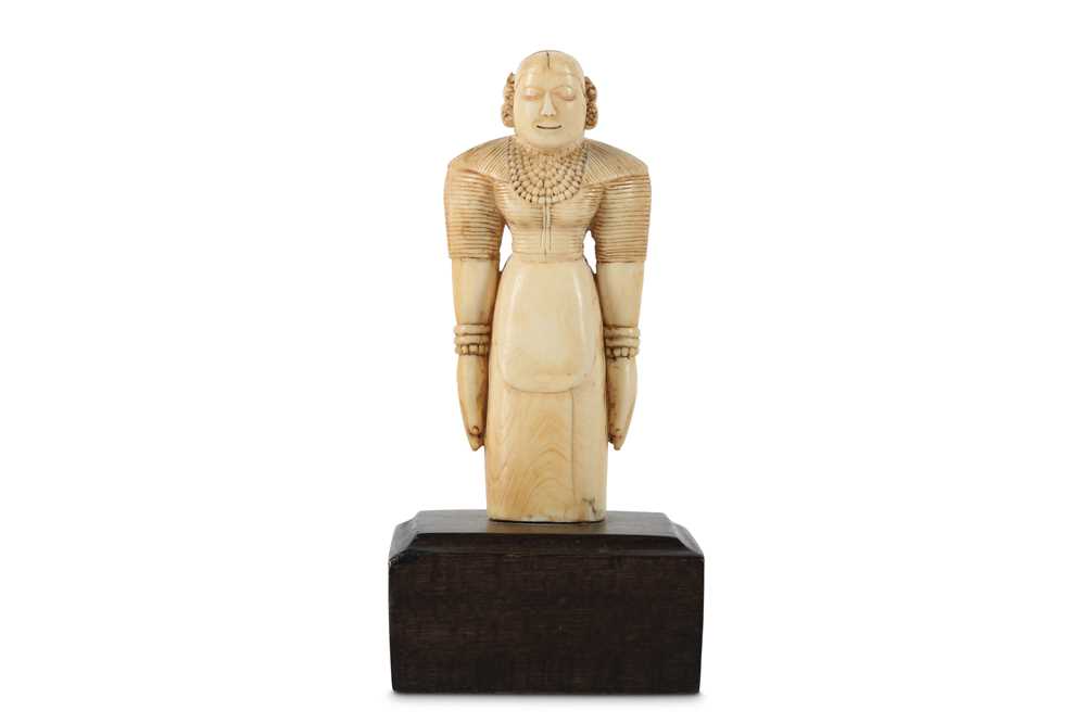 Lot 169 - A SINHALESE IVORY FIGURINE Sri Lanka, Kandyan...