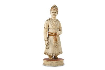 Lot 176 - A GOLD AND POLYCHROME-PAINTED IVORY FIGURINE ...
