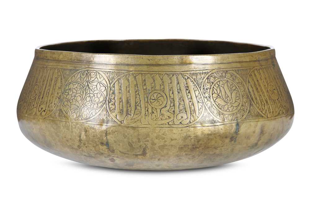 Lot 62 - A MAMLUK BRASS BOWL  Egypt or Syria, late 15th...