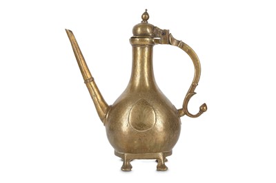 Lot 200 - A FOOTED BRASS MUGHAL EWER  North India, late...