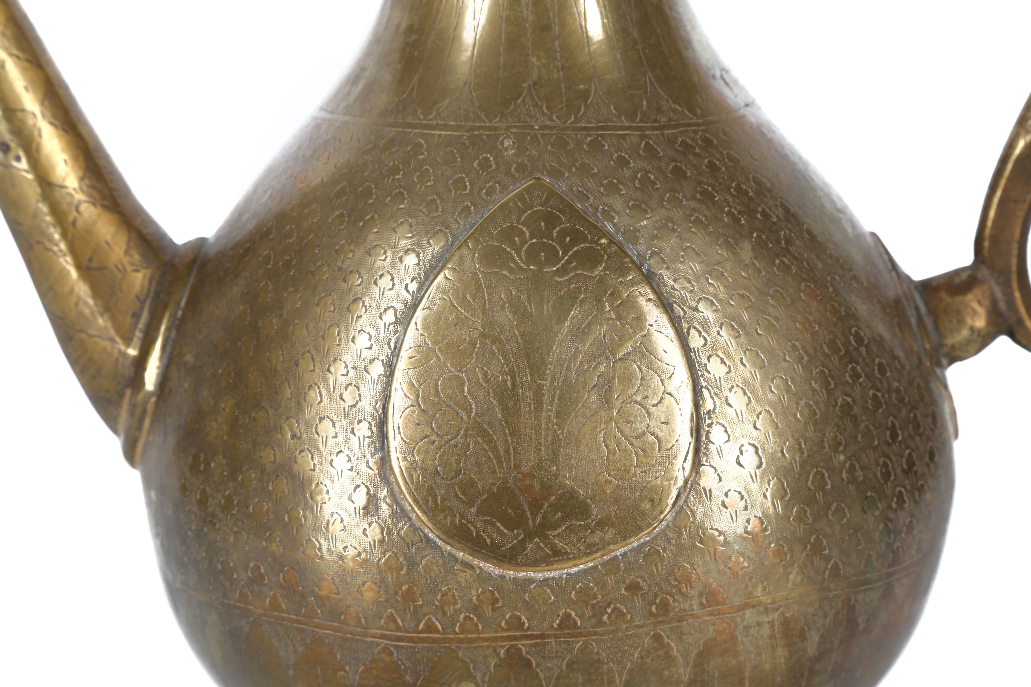 Lot 200 - A FOOTED BRASS MUGHAL EWER North India,