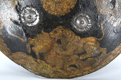 Lot 192 - A LACQUERED RAWHIDE SHIELD (DHAL) North India,...