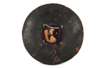 Lot 192 - A LACQUERED RAWHIDE SHIELD (DHAL) North India,...
