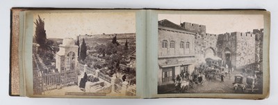 Lot 97 - A BLACK AND WHITE PHOTO ALBUM WITH VIEWS OF...