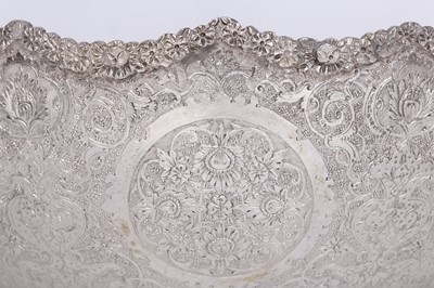 Lot 163 - A LATE QAJAR SET OF A SILVER BOWL AND TRAY...