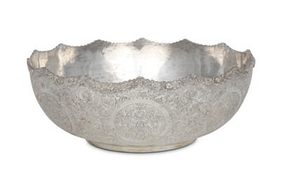 Lot 163 - A LATE QAJAR SET OF A SILVER BOWL AND TRAY...