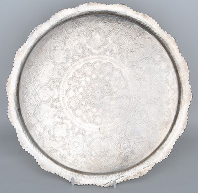 Lot 163 - A LATE QAJAR SET OF A SILVER BOWL AND TRAY...