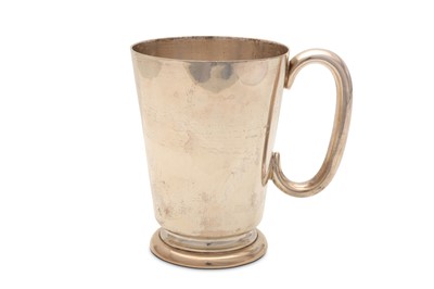 Lot 105 - An Elizabeth II sterling silver mug, London...