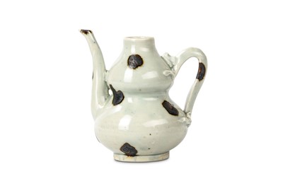 Lot 321 - A CHINESE QINGBAI DOUBLE GOURD EWER. Ming...