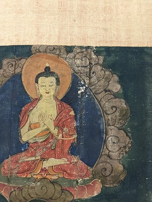 Lot 556 - A TIBETAN THANGKA PAINTING. Ink and colour on...