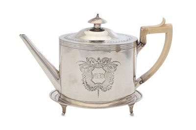 Lot 245 - A George III antique sterling silver teapot on...