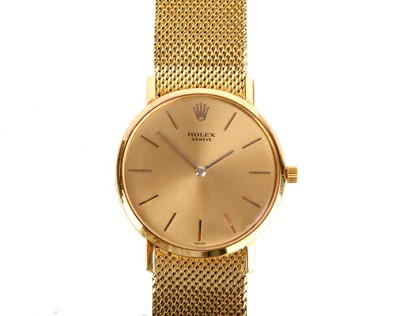 Lot 365 - ROLEX. AN 18K GOLD MANUAL WIND BRACELET WATCH....