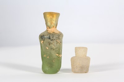Lot 2 - TWO IRANIAN SMALL CLEAR GLASS BOTTLES ...