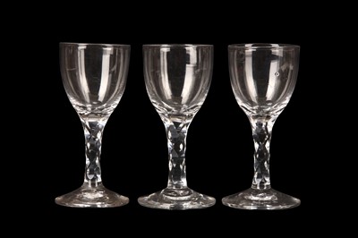 Lot 226 - THREE FACET-CUT WINE GLASSES, circa 1785, each...