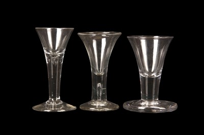 Lot 215 - TWO PLAIN-STEMMED CORDIAL OR WINE GLASSES AND...