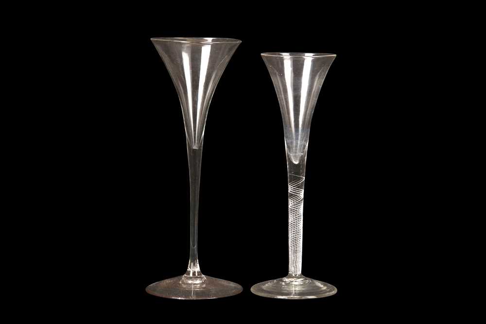 Lot 214 - TWO TOASTING GLASSES, mid-18th Century, both...