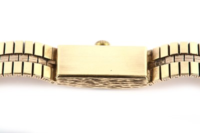 Lot 318 - JEAN RENET. A LADIES 9K GOLD MANUAL WIND...