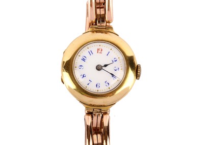 Lot 335 - 18K GOLD LADIES MANUAL WIND BRACELET WATCH. ...