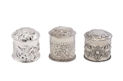 Lot 226 - Three antique sterling silver embossed tea...