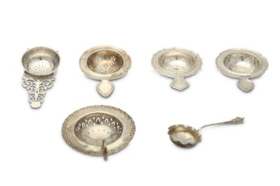 Lot 163 - A mixed group of silver tea strainers...