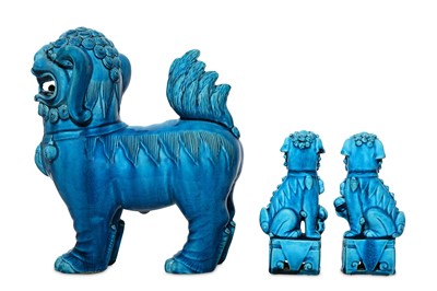 Lot 54 - THREE TURQUOISE-GLAZED BUDDHIST LION DOGS....