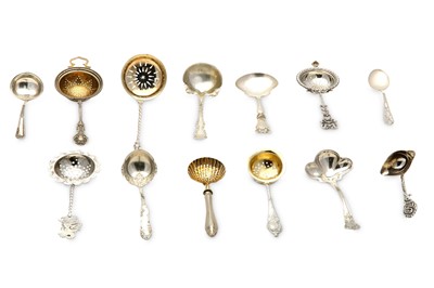 Lot 165 - A mixed group of silver sifting spoons and...