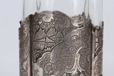 Lot 180 - A LATE QAJAR SILVER BRUSH AND GLASS BOTTLE ...