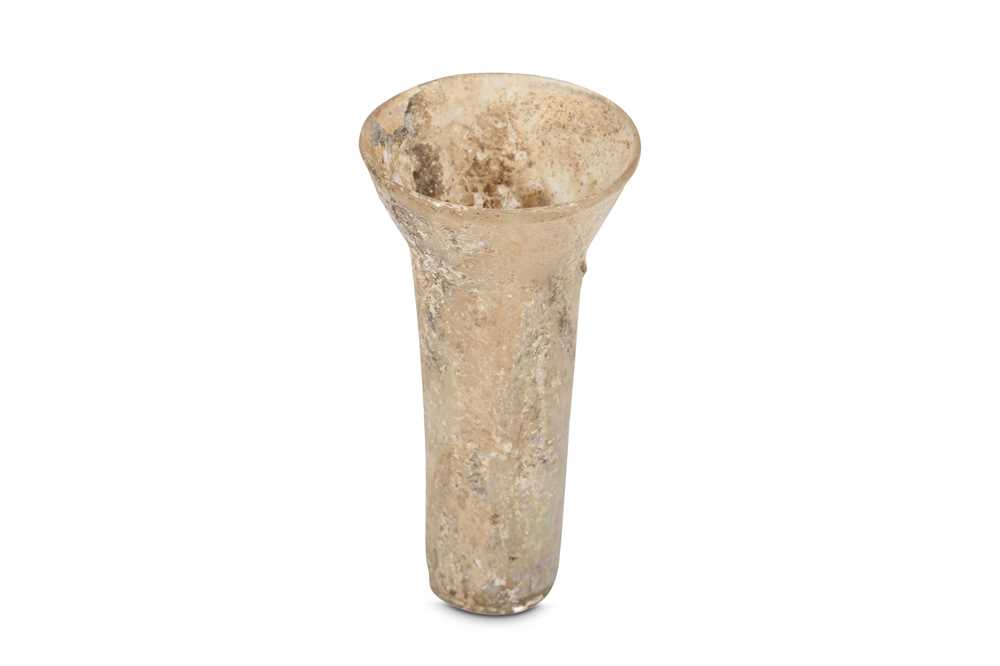 Lot 18 - AN INTACT CLEAR GLASS BEAKER Syria or Egypt,...