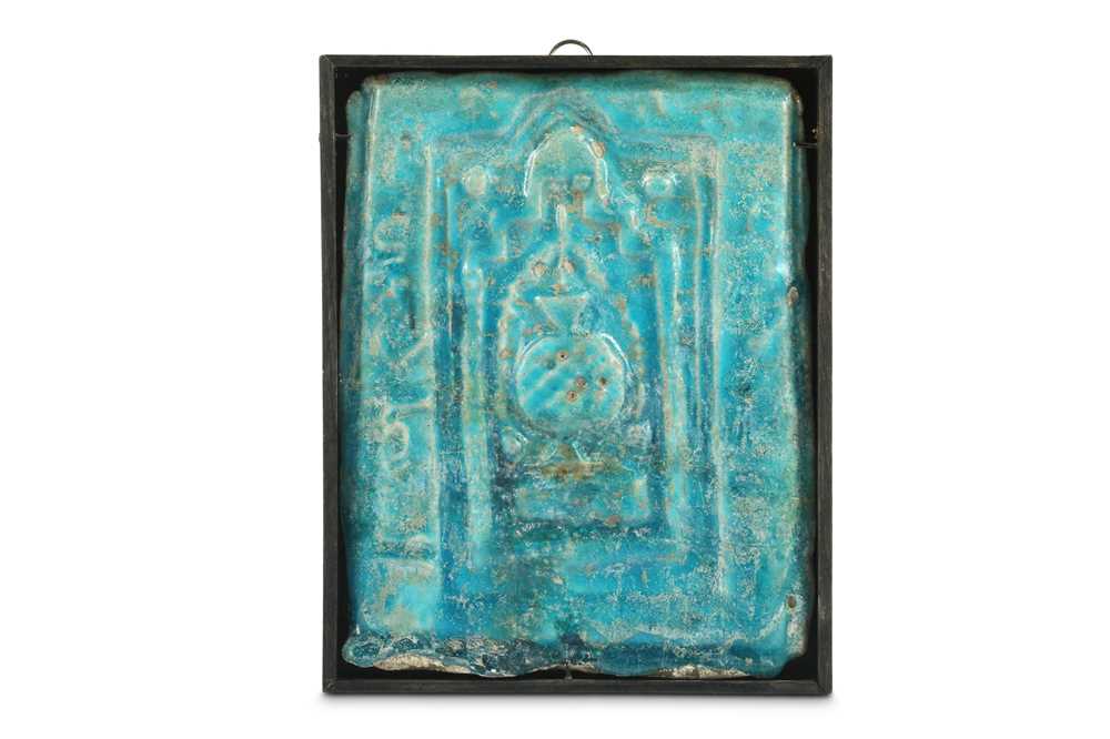 Lot 8 - A TURQUOISE-GLAZED MOULDED MIHRAB POTTERY...