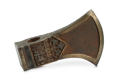 Lot 272 - A BRASS-INLAID STEEL SADDLE-AXE HEAD...