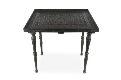 Lot 267 - AN INDIAN EBONISED WOOD LOW TABLE Delhi, India,...
