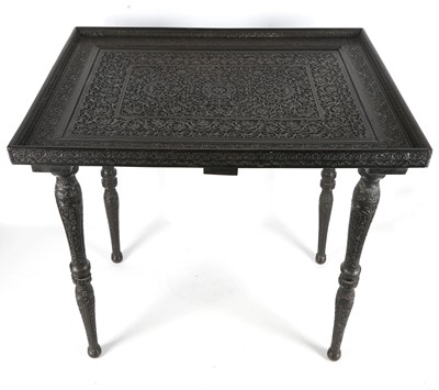 Lot 267 - AN INDIAN EBONISED WOOD LOW TABLE Delhi, India,...