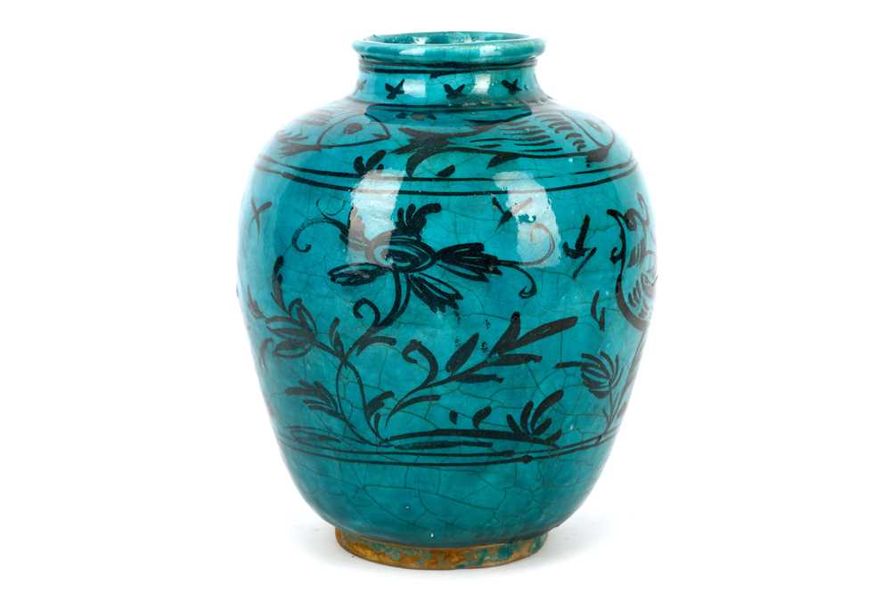 Lot 216 - A Qajar turquoise-glazed pottery vase Iran,...