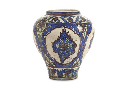 Lot 165 - A QAJAR POTTERY VASE Iran, late 19th - early...
