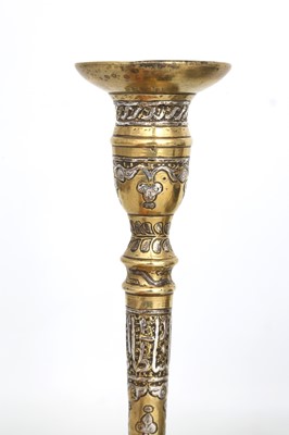 Lot 113 - A MAMLUK-REVIVAL BRASS BOWL AND CANDLESTICK...
