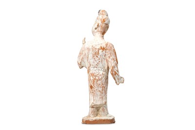 Lot 77 - A CHINESE POTTERY FIGURE. Tang Dynasty....