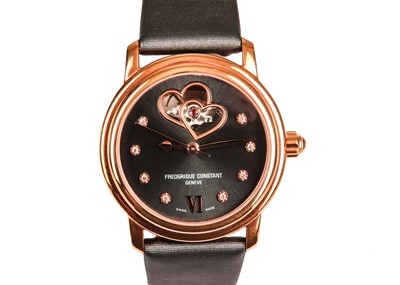 Lot 332 - FREDERIQUE CONSTANT. A LADIES GOLD PLATED...