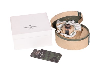 Lot 332 - FREDERIQUE CONSTANT. A LADIES GOLD PLATED...