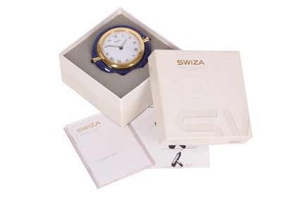 Lot 434 - SWIZA ALARM QUARTZ CLOCK. Maker: Swiza. Date:...