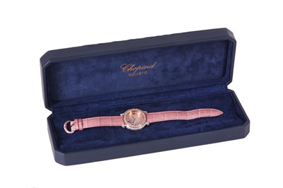 Lot 310 - CHOPARD. AN 18 K GOLD AND GEM SET QUARTZ...