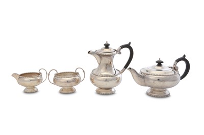 Lot 258 - An Elizabeth II sterling silver four-piece tea...