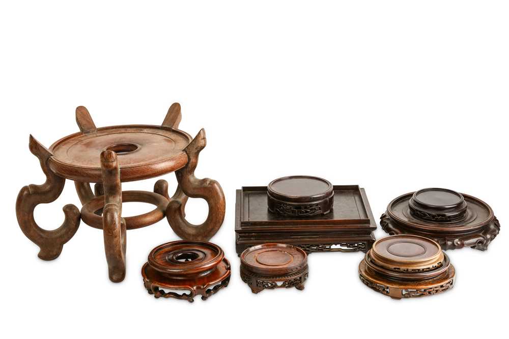 Lot 864 - A COLLECTION OF WOOD STANDS.