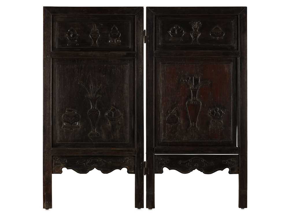 Lot 420 - A CHINESE TWO-PANEL CARVED WOODEN SCREEN. Qing...
