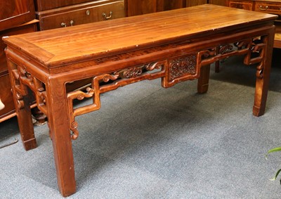 Lot 411 - A Chinese elm altar table with carved and...