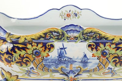 Lot 187 - A DESVRES TWIN-HANDLED FAIENCE JARDINIERE,...