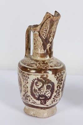 Lot 10 - * TWO SMALL COPPER-LUSTRE POTTERY EWERS ...