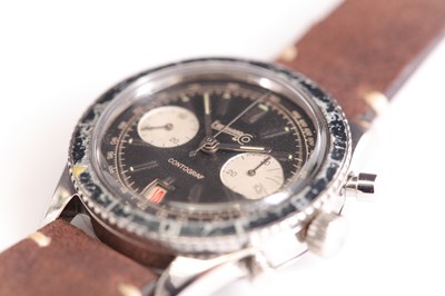 Lot 361 - EBERHARD. A RARE STAINLESS STEEL MANUAL WIND...