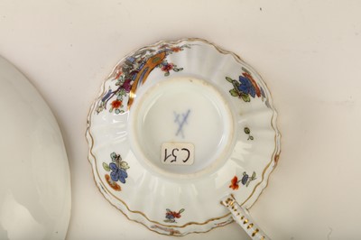Lot 69 - A MEISSEN TEACUP AND SAUCER, circa 1745, with...