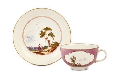 Lot 34 - A MEISSEN PURPLE-GROUND TEACUP AND SAUCER,...