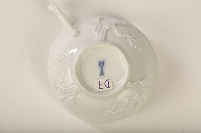 Lot 49 - A MEISSEN WHITE TEACUP AND SAUCER, circa 1745,...